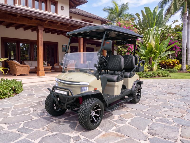Denago Rover XL6 six-seat electric golf cart in khaki on a flagstone driveway in front of a villa with a wooden veranda and rattan chairs in Casa de Campo