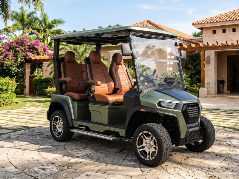 ECO Azure 4 2WD electric golf cart in Pangea Green with brown seats parked in front of a villa with a terracotta roof