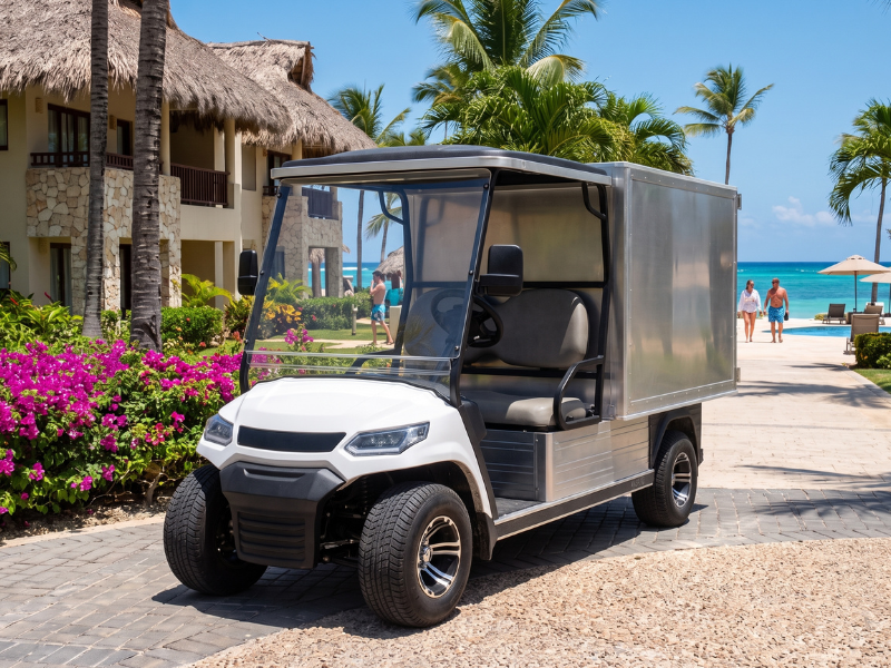 ECO Cross 2 Room Service electric golf cart with enclosed aluminium delivery box at a resort