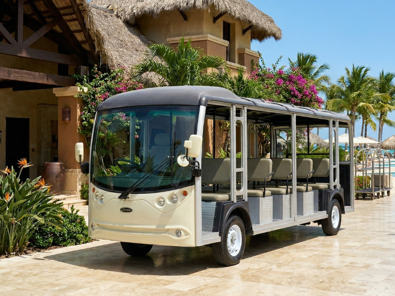 ECO E-Bus S23 twenty-three-seat electric bus beside a resort pool